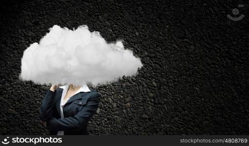 Businesswoman standing with his head in cloud. Floating in sky