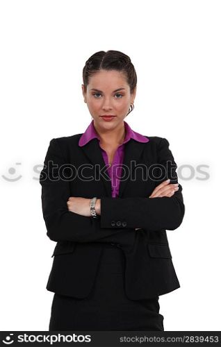 Businesswoman stood with arms crossed