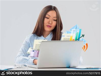 Businesswoman success. Business as concept. Business symbols flying from laptop