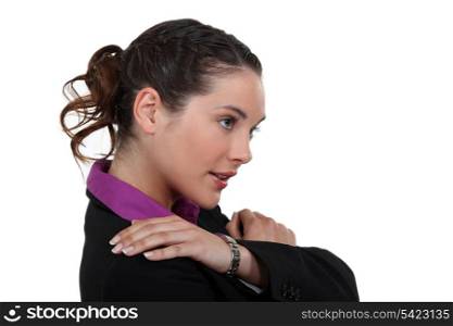 Businesswoman suffering from shoulder pain