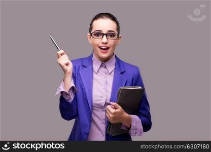 Businesswoman surprised on gray background