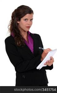 businesswoman taking notes