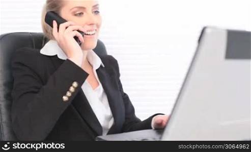 Businesswoman Talking On Mobile Phone