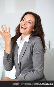 Businesswoman talking with hands