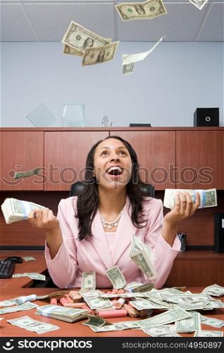 Businesswoman throwing money