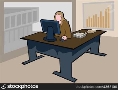 Businesswoman using a computer in an office