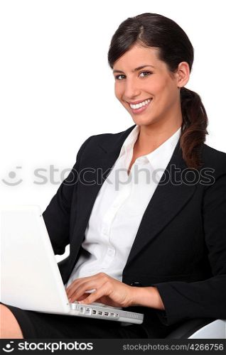 Businesswoman using a laptop computer