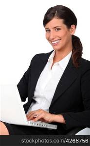 Businesswoman using a laptop computer