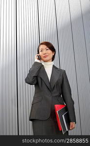 Businesswoman Using Cell Phone