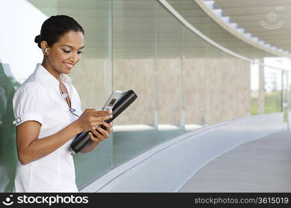 Businesswoman Using Cell Phone