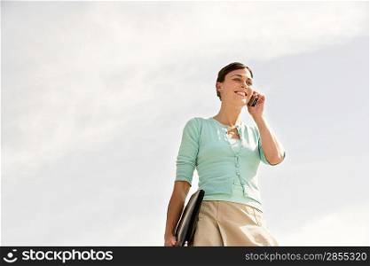 Businesswoman Using Cell Phone Outdoors