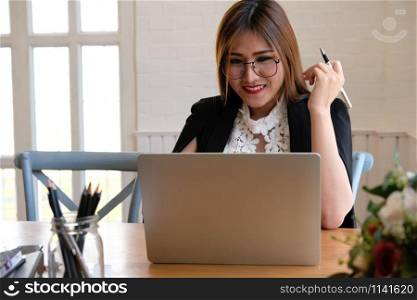 businesswoman using computer. startup woman working with laptop at office.