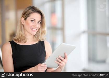 Businesswoman using electronic tab
