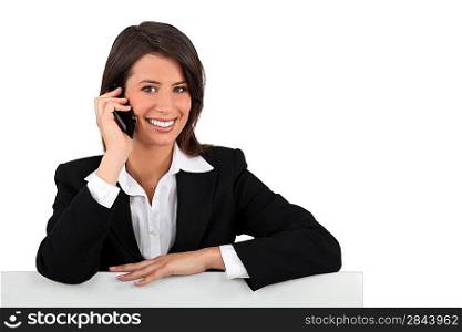 Businesswoman using her cellphone