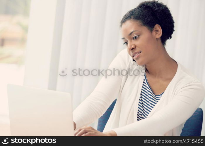 Businesswoman using her mobile in offfice