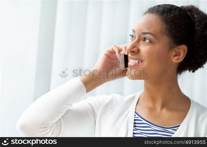 Businesswoman using her mobile in offfice