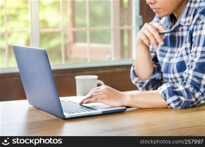 businesswoman using laptop computer in office. hipster tone. businesswoman using laptop