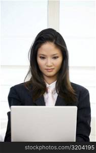 Businesswoman using on a laptop