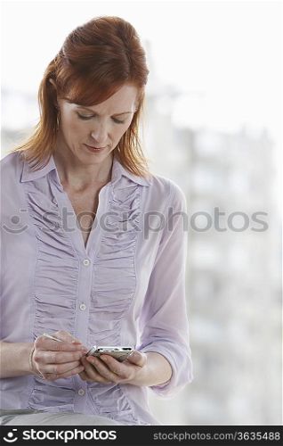 Businesswoman Using PDA