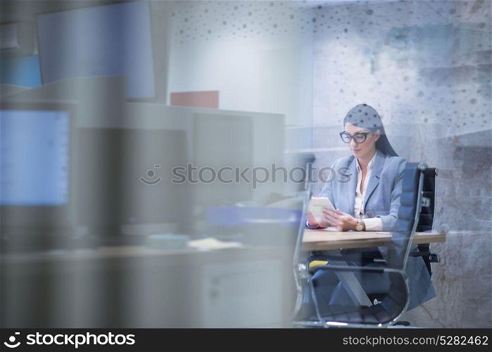 Businesswoman using tablet at the work in office