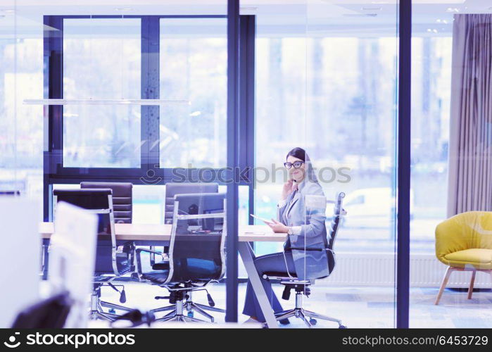 Businesswoman using tablet at the work in office