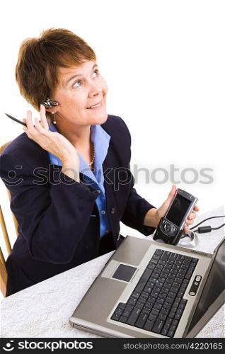 Businesswoman using technology to work from her home. Isolated on white.