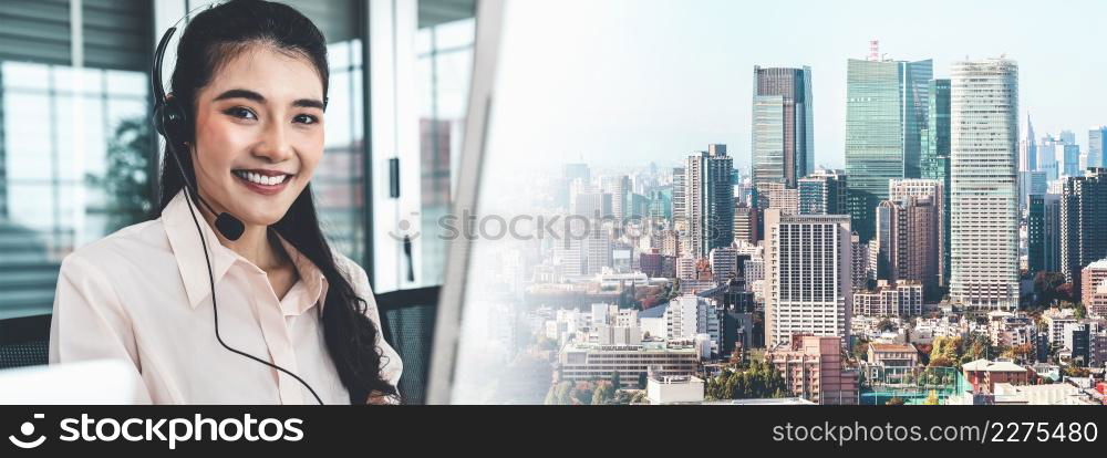 Businesswoman wearing headset working actively in office . Call center, telemarketing, customer support agent provide service on telephone video conference call.. Businesswoman wearing headset working actively in office