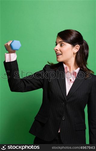 Businesswoman weightlifting