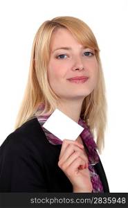 Businesswoman with a blank business card