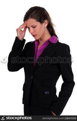 Businesswoman with a headache