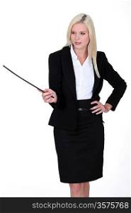 Businesswoman with a stick