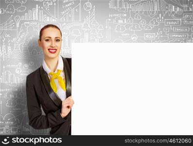 Businesswoman with blank banner. Young businesswoman holding white blank banner. Place for text