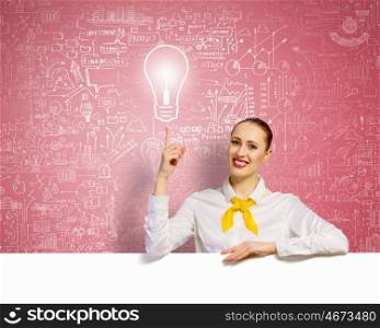 Businesswoman with blank banner. Young businesswoman holding white blank banner. Place for text