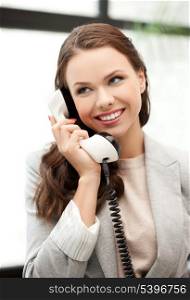 businesswoman with cell phone calling or talking