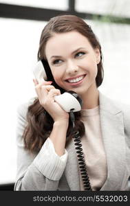 businesswoman with cell phone calling or talking