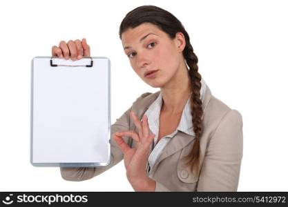 Businesswoman with clip-board