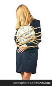 Businesswoman with clock tied up on white