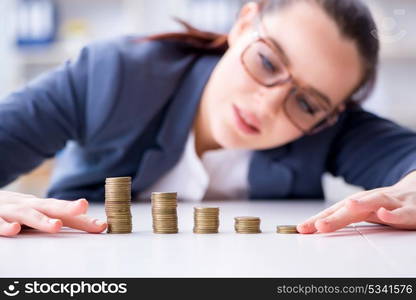 Businesswoman with coins in forex concept