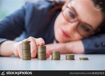 Businesswoman with coins in forex concept