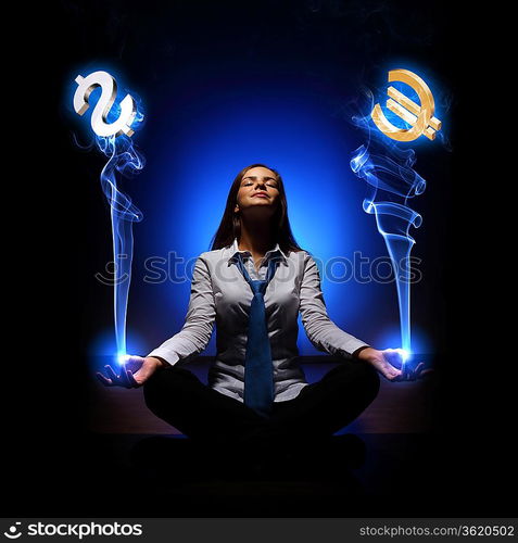 Businesswoman with financial symbols around her on the background