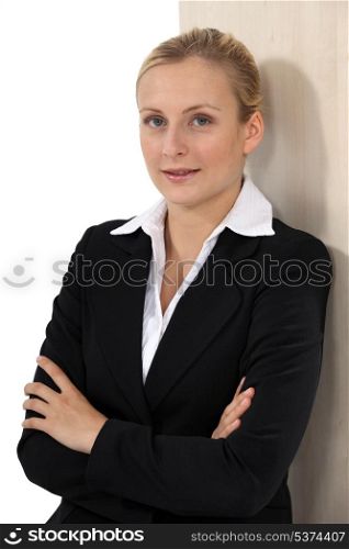 Businesswoman with her arms folded