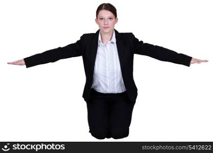 Businesswoman with her arms out