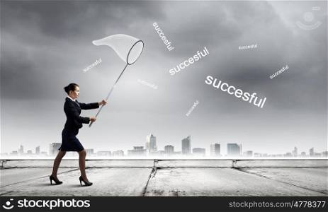 Businesswoman with hoop. Young businesswoman catching word successful with hoop