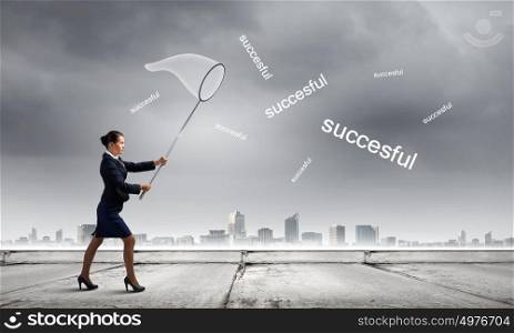 Businesswoman with hoop. Young businesswoman catching word successful with hoop