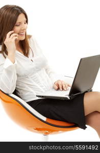 businesswoman with laptop and phone in orange chair over white