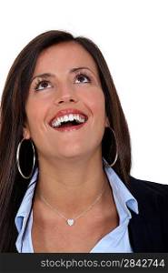 Businesswoman with look of amazement on face