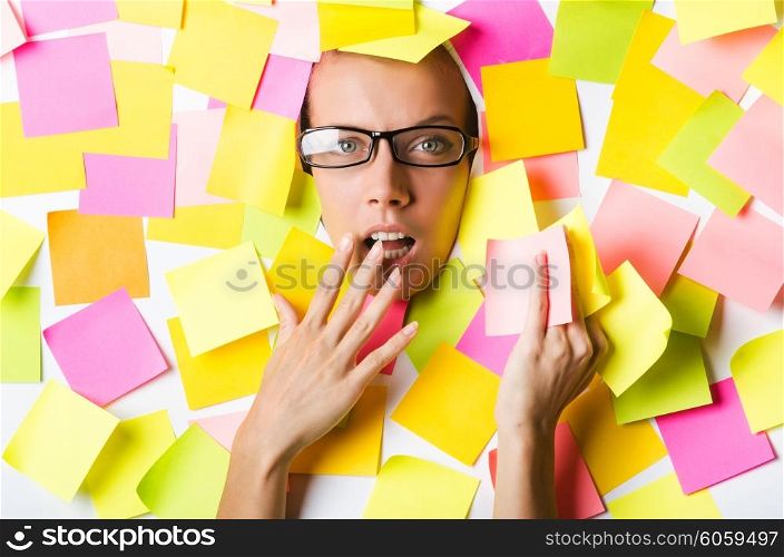 Businesswoman with lots of reminder notes