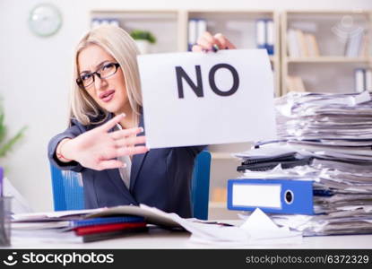 Businesswoman with message in office at desk