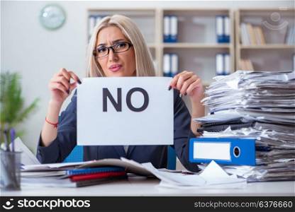 Businesswoman with message in office at desk