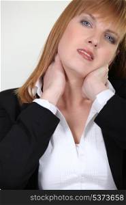 Businesswoman with neck ache